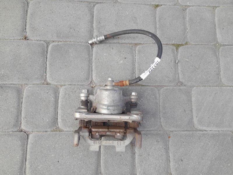 Суппорт тормозной задний левый Q50 15-20