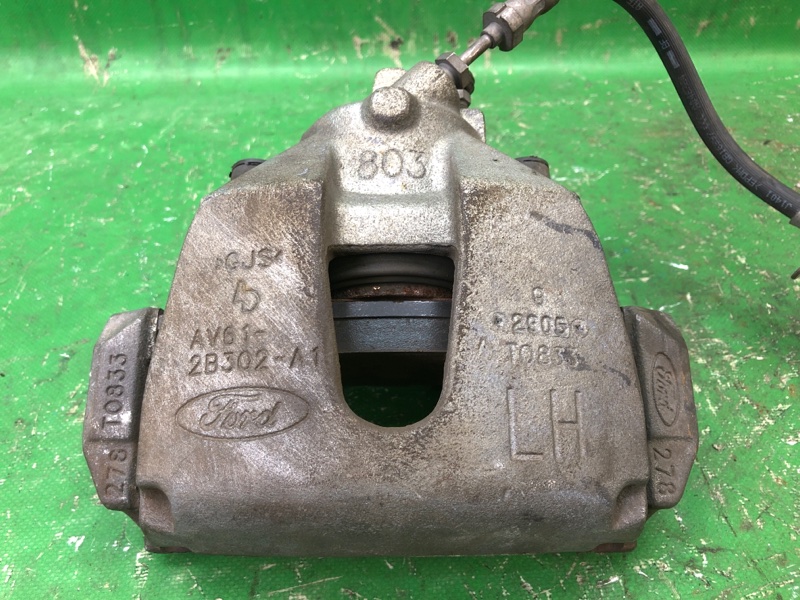 Суппорт тормозной передний левый FORD FOCUS 10-18 MK3 CV6Z-2B121-A Б/У