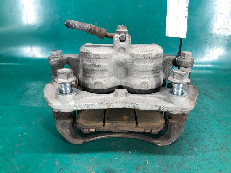 Суппорт тормозной передний левый LEAF 10-17 2012