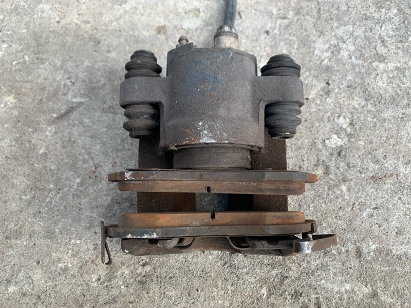 Суппорт тормозной задний левый QX56 / TITAN / ARMADA 04-16 2008 VK56DE