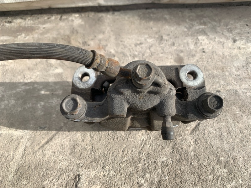 Суппорт тормозной задний левый NISSAN ALTIMA L32 07-12 Седан 2.5 QR25DE