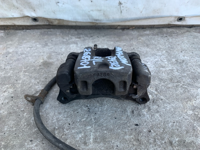 Суппорт тормозной задний левый AVALON 99-05 2000 3.0 1MZFE