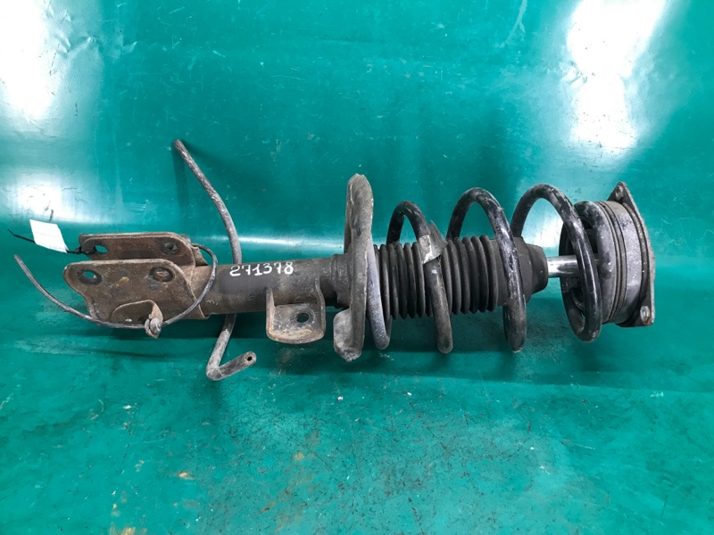 Амортизатор передний левый NV200 USA 13- 2.0