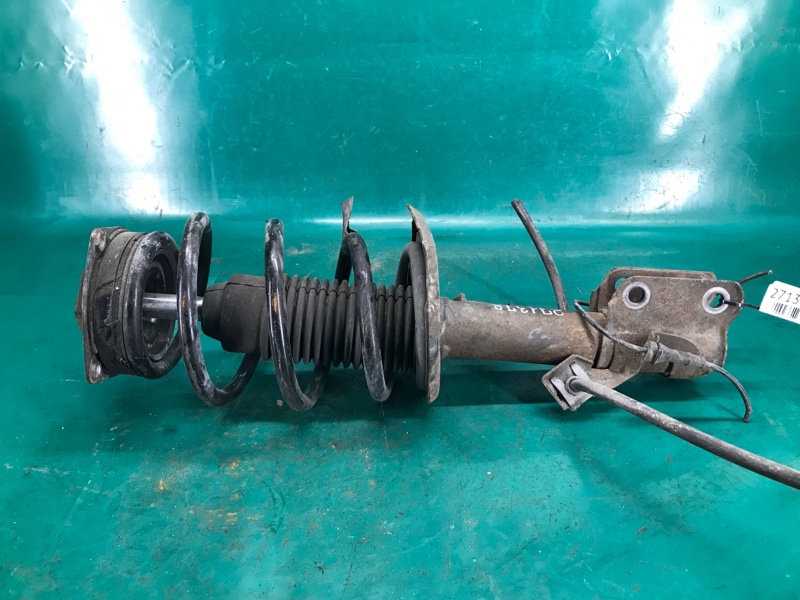 Амортизатор передний левый NISSAN NV200 USA 13- 2.0