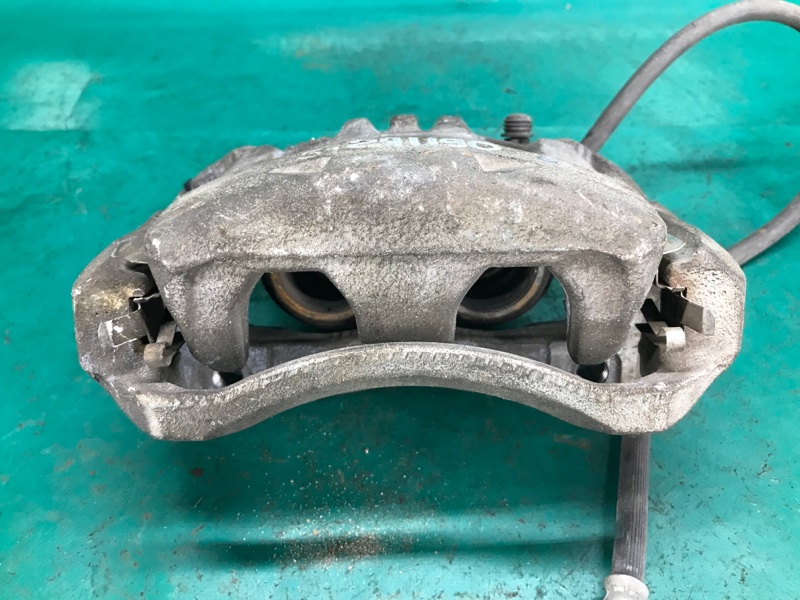 Суппорт тормозной передний левый NV200 USA 13- 2018 2.0 MR20DE Суппорт тормозной передний левый NV200 USA 13- 2018 2.0 MR20DE