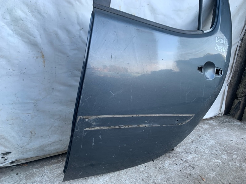 Дверь задняя левая MITSUBISHI L200 06-14