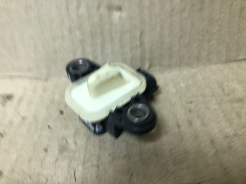 Датчик удара передний левый QUEST S 11-17 2014 Минивен E52 3.5