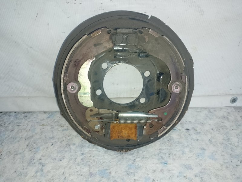 Тормозной механизм задний левый NISSAN NV200 USA 13- 2018 2.0 MR20DE 44010-3LM0B Б/У