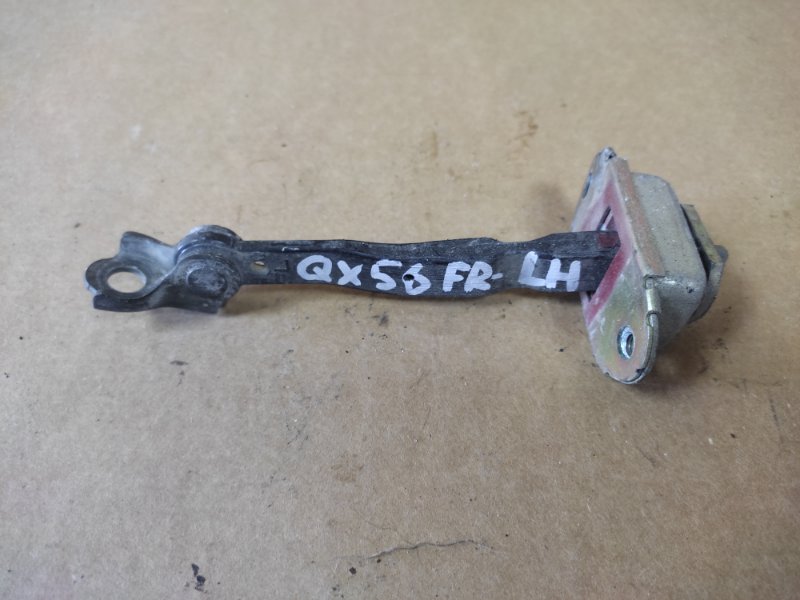 Ограничитель двери передний левый QX56 / TITAN / ARMADA 04-16