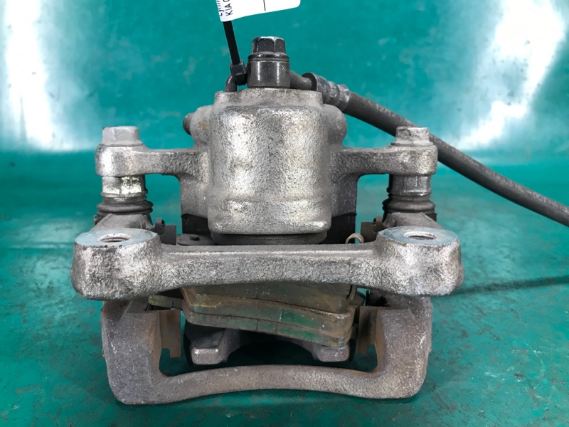 Суппорт тормозной задний правый OPTIMA TF 11-16 TF Суппорт тормозной задний правый OPTIMA TF 11-16 TF