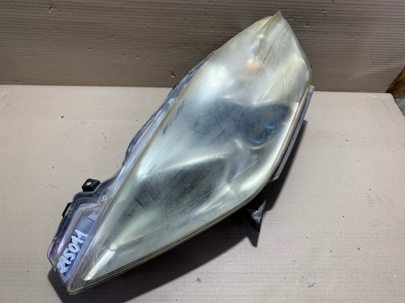 Фара левая NISSAN LEAF 10-17