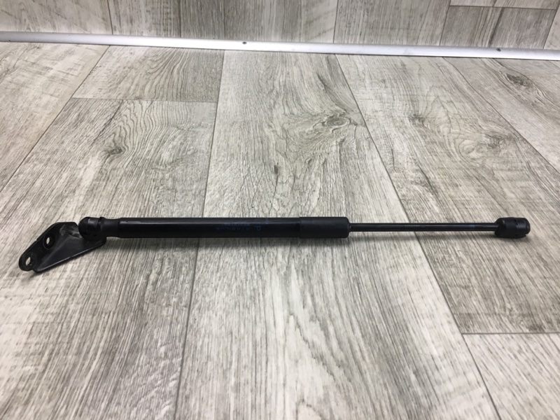 Амортизатор крышки багажника левый LEAF 10-17