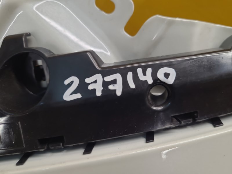 Кронштейн переднего бампера (на крыле) передний левый LEAF 18-