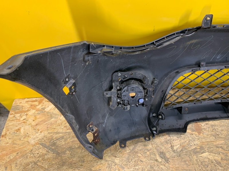 Бампер передний L200 06-14