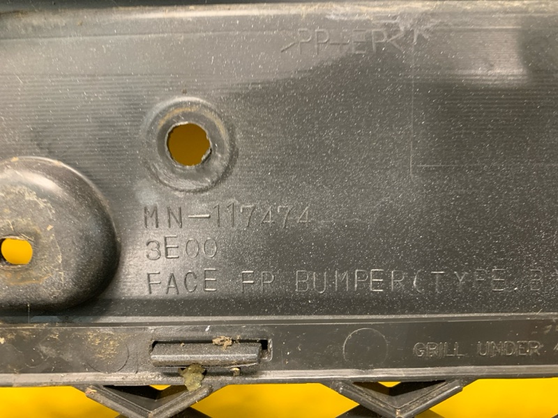 Бампер передний L200 06-14