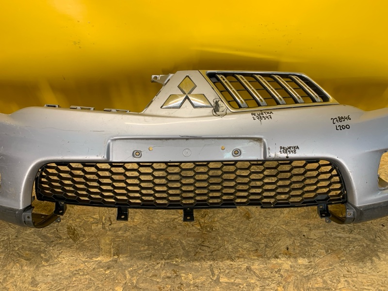 Бампер передний L200 06-14