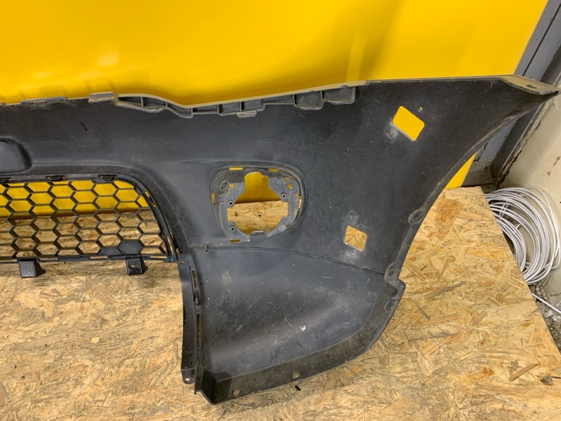 Бампер передний L200 06-14