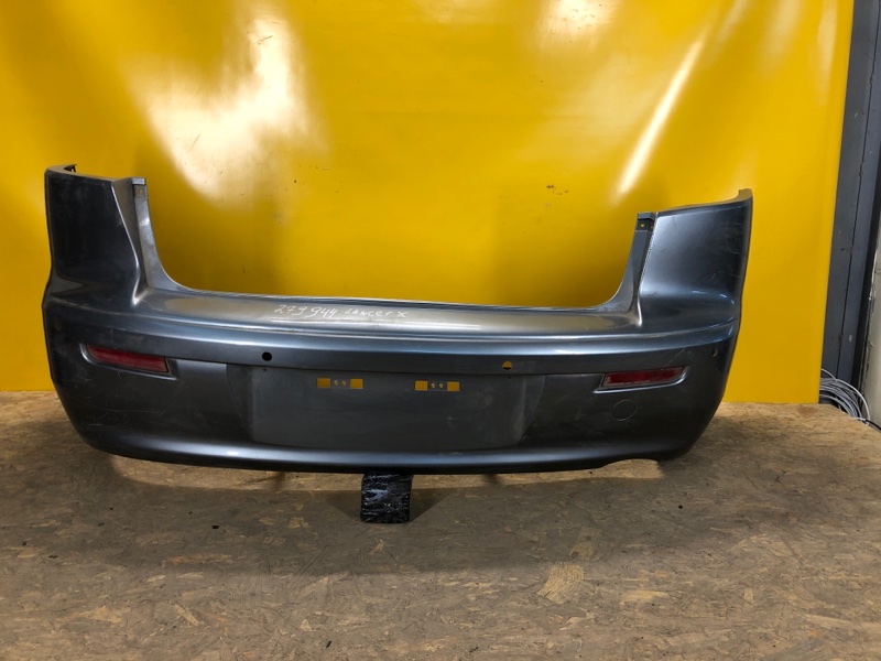 Бампер задний MITSUBISHI LANCER X 10 07-15 6410B832 Б/У