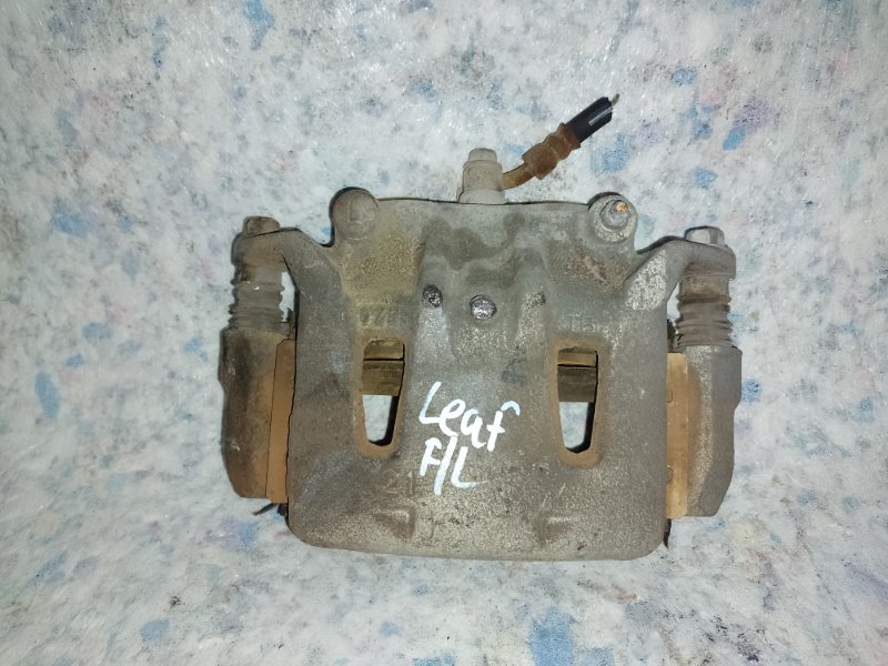 Суппорт тормозной передний левый NISSAN LEAF 10-17 41011-1VA0B Б/У