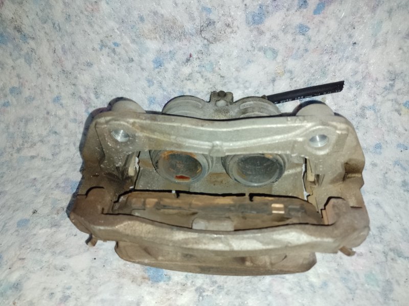 Суппорт тормозной передний левый LEAF 10-17