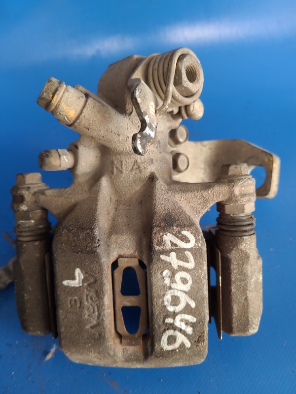 Суппорт тормозной задний левый HONDA CIVIC 4D 06-11