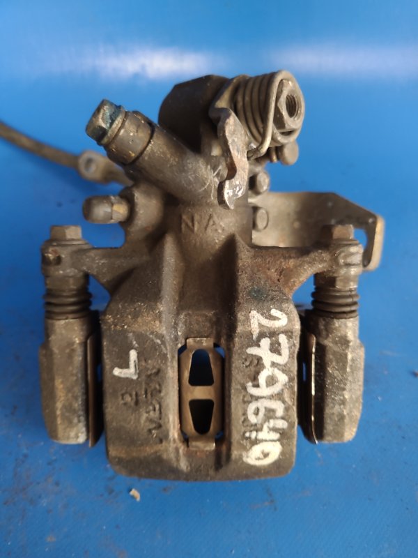 Суппорт тормозной задний левый HONDA CIVIC 4D 06-11