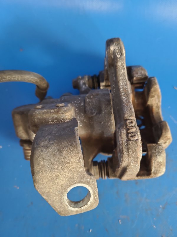 Суппорт тормозной задний левый CIVIC 4D 06-11