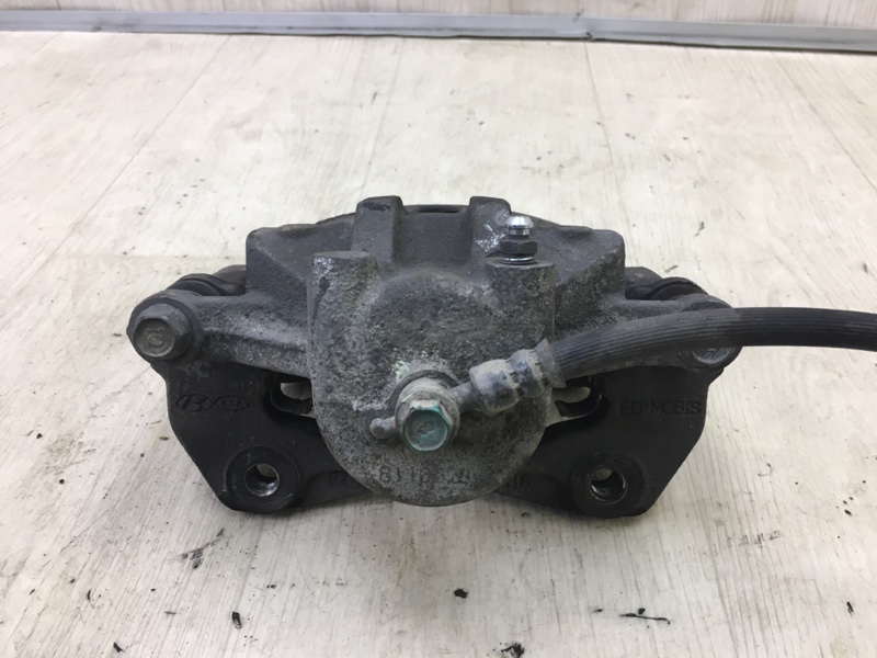 Суппорт тормозной передний левый I30 FD 07-12