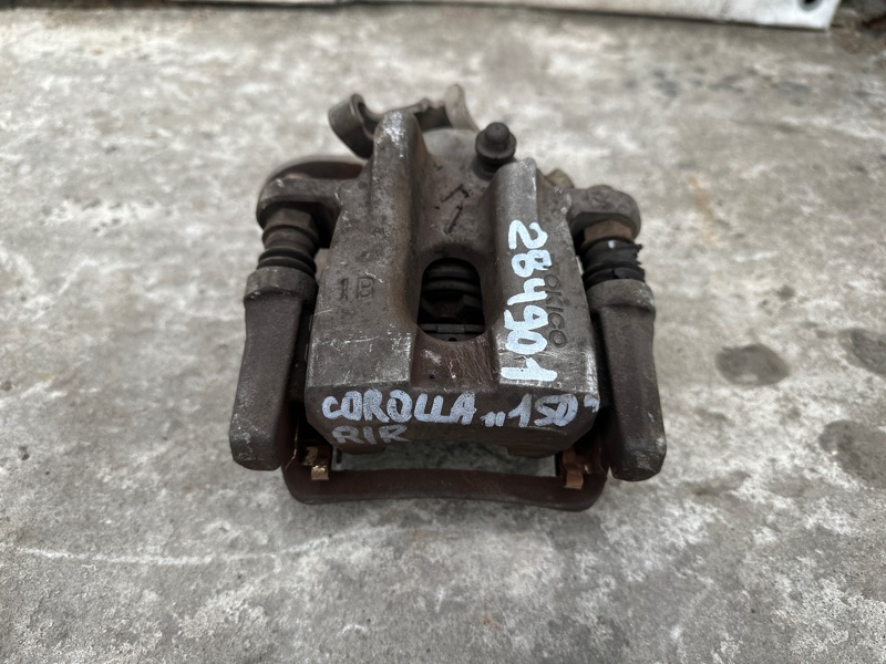 Суппорт тормозной задний правый COROLLA 150 06-13