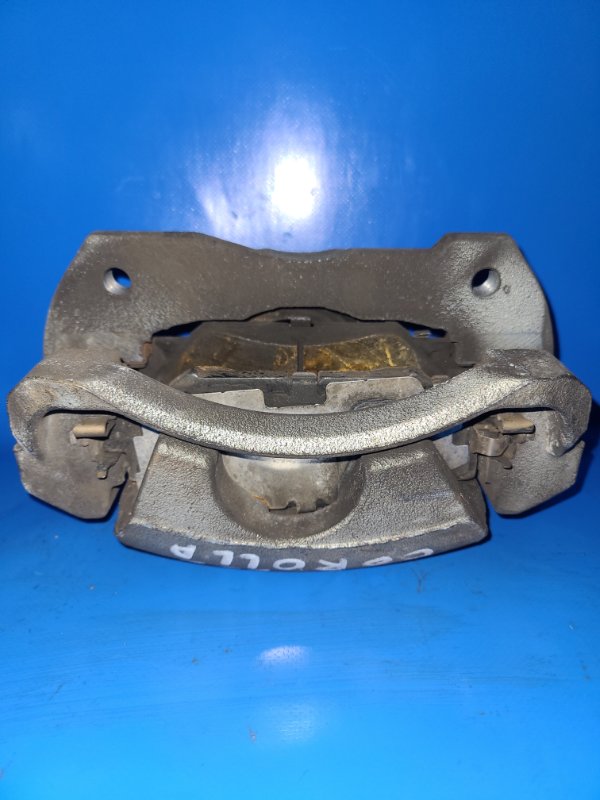 Суппорт тормозной передний правый COROLLA 150 06-13