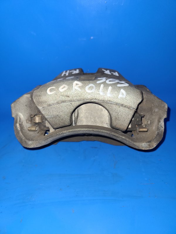 Суппорт тормозной передний правый COROLLA 150 06-13