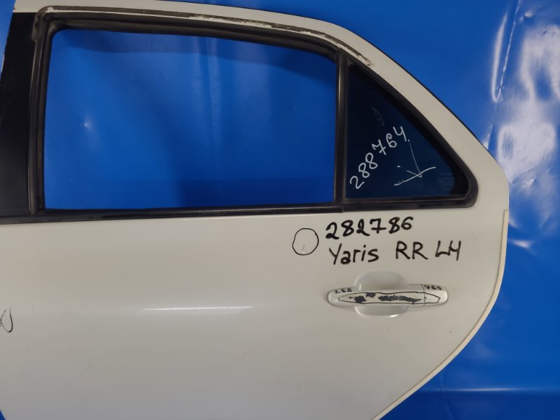 Дверь задняя левая YARIS 05–11
