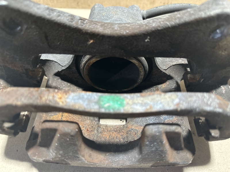 Суппорт тормозной передний правый LANCER X 10 07-15