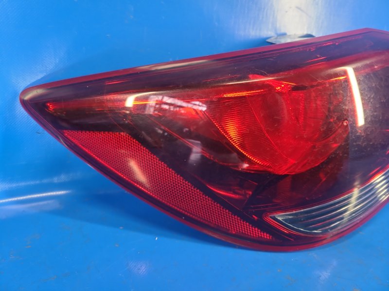 Фонарь наружный левый MAZDA 2 DE 07-15