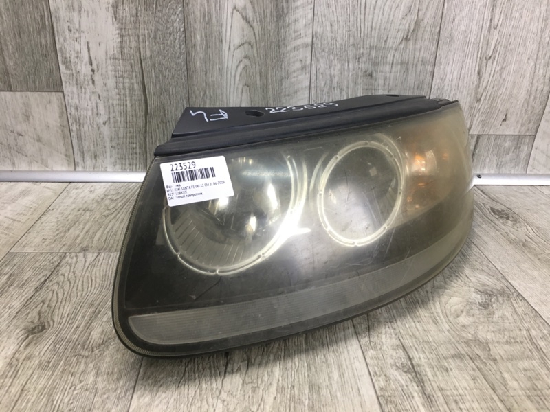 Фара левая SANTA FE (CM) 05-12 2006-2009 CM