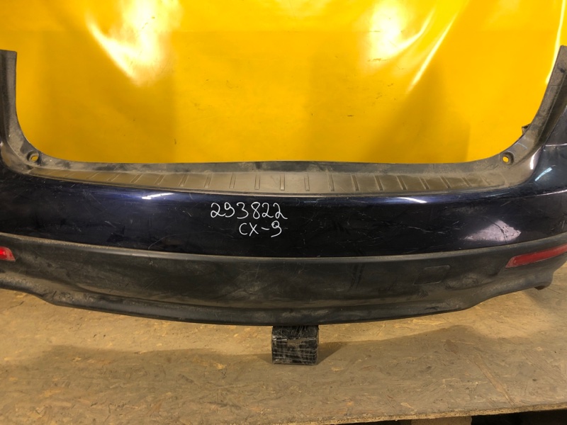 Бампер задний CX-9 06-16