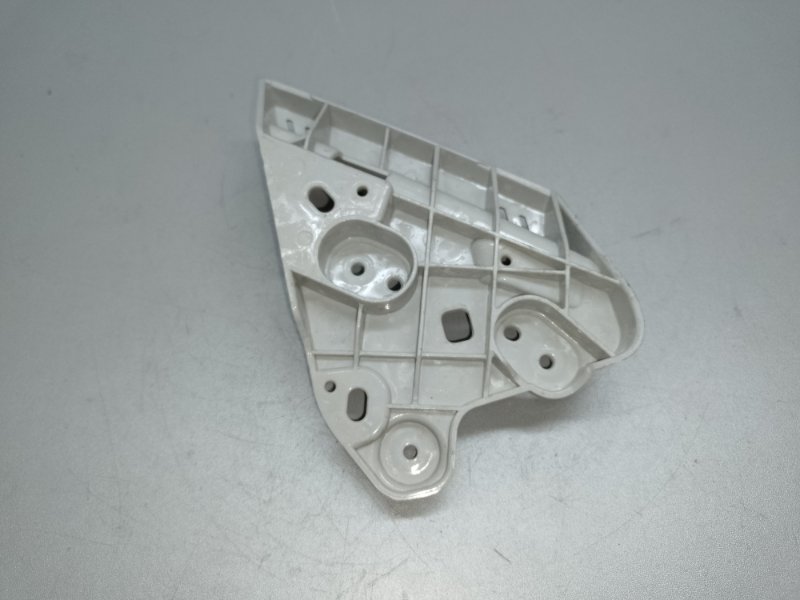 Кронштейн переднего бампера (под фарой) левый NISSAN ALTIMA L33 12-18