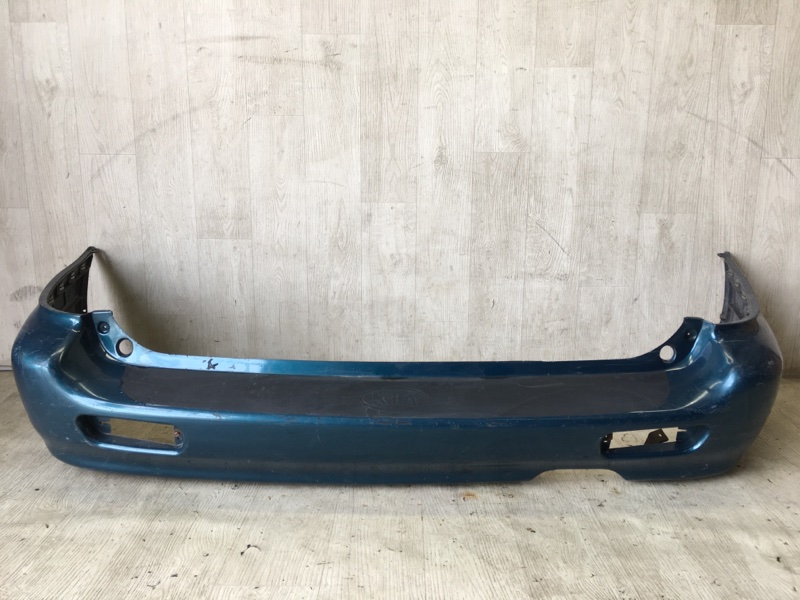 Бампер задний KIA CLARUS 96-01 0K9D0-50221-AXX Б/У