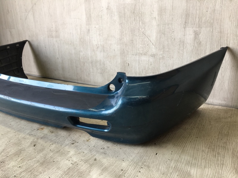 Бампер задний KIA CLARUS 96-01