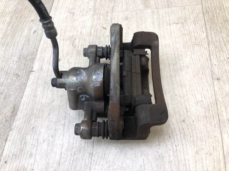 Суппорт тормозной задний левый KIA FORTE/CERATO TD 08-13 TD 2.0 G4KD