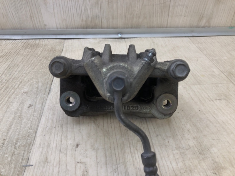 Суппорт тормозной задний левый FORTE/CERATO TD 08-13 2011 TD 2.0 G4KD