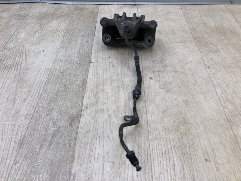 Суппорт тормозной задний левый FORTE/CERATO TD 08-13 2011 TD 2.0 G4KD