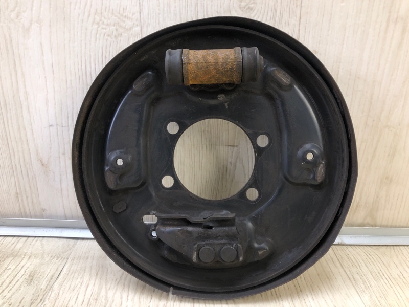 Тормозной механизм задний левый NISSAN NV200 USA 13- 2013 2.0 MR20DE 440303LM0A Б/У