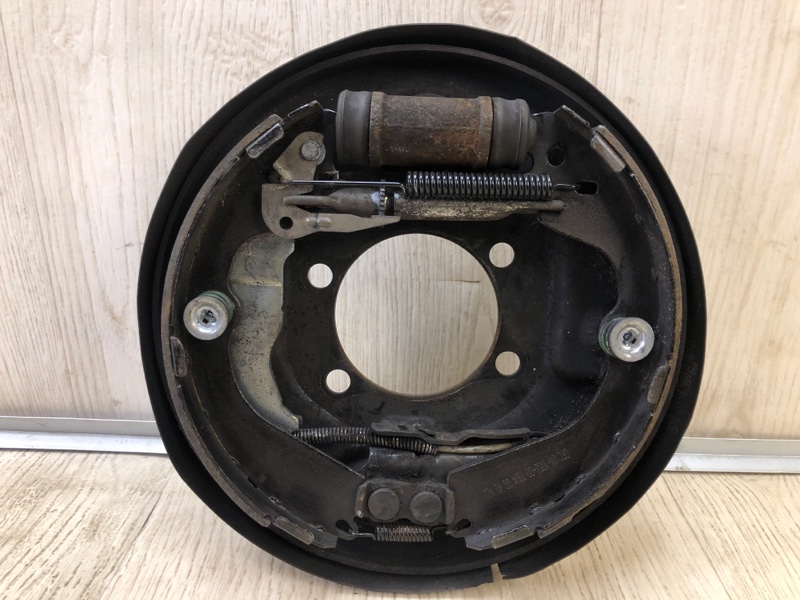 Тормозной механизм задний правый NISSAN NV200 USA 13- 2013 2.0 MR20DE 440203LM0A Б/У