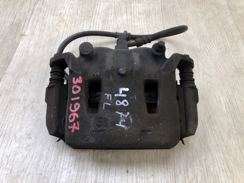 Суппорт тормозной передний левый NISSAN NV200 USA 13- 2013 2.0 MR20DE 410113LM0A Б/У