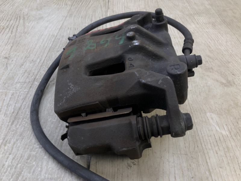 Суппорт тормозной передний правый NV200 USA 13- 2013 2.0 MR20DE