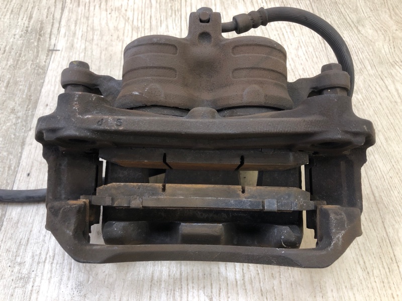 Суппорт тормозной передний правый NV200 USA 13- 2013 2.0 MR20DE