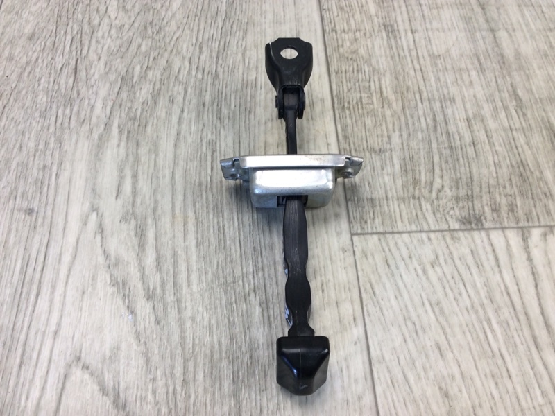 Ограничитель двери задний левый ALTIMA L33 12-18