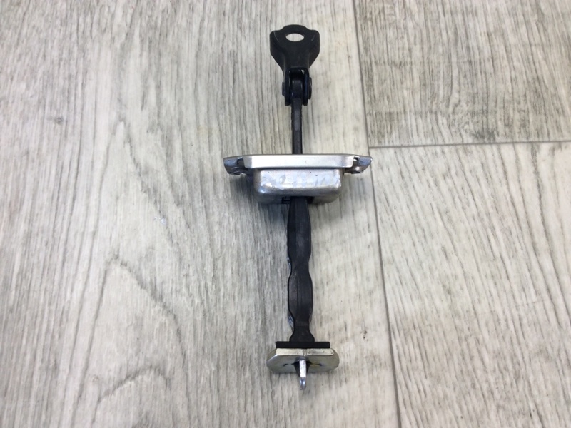 Ограничитель двери задний левый ALTIMA L33 12-18