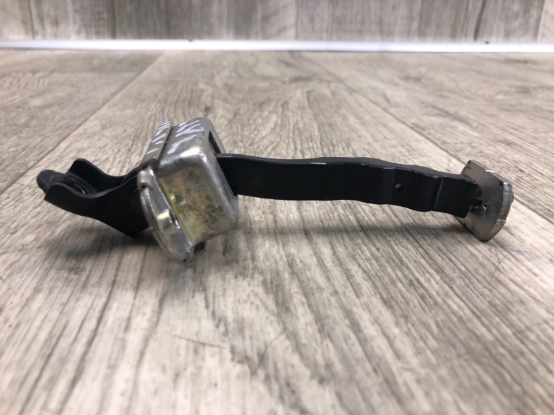 Ограничитель двери передний правый NISSAN NV200 USA 13- 2.0 MR20DE